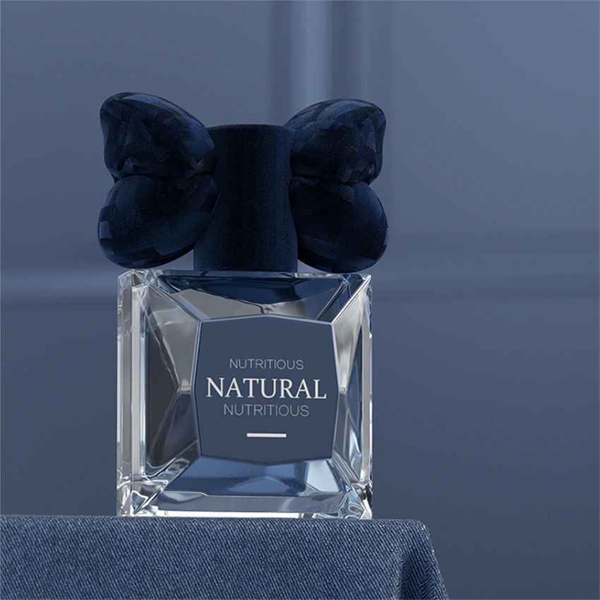 Perfume bottle with bow cap