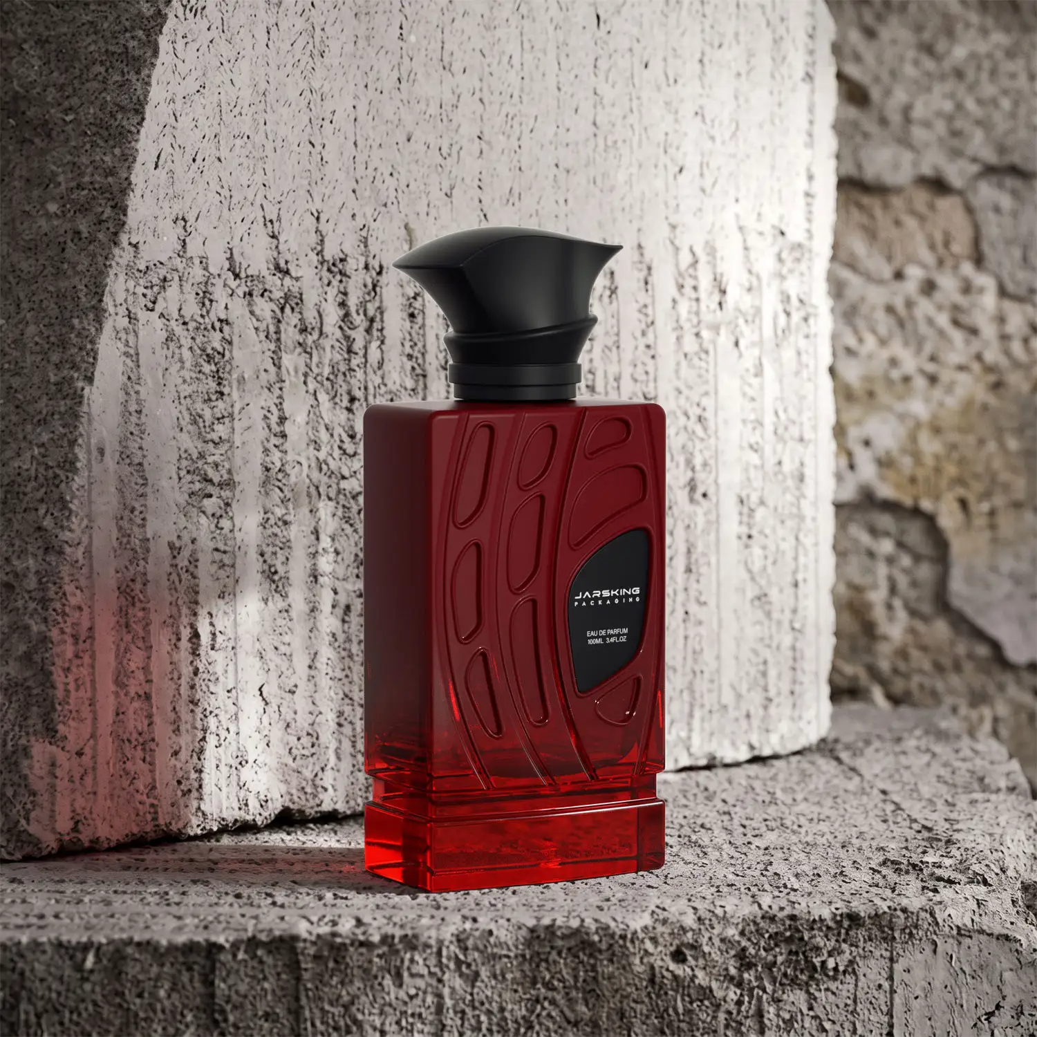 Luxury glass perfume bottle with deep red fragrance and decorative cap